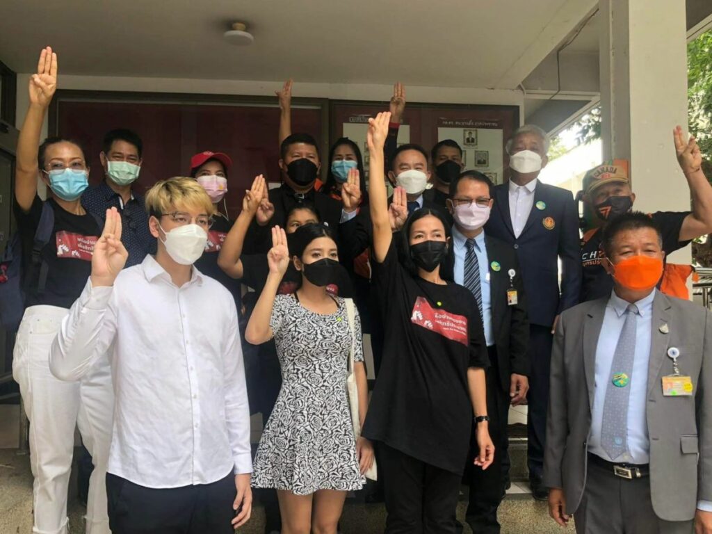 Labor activists and their legal team reporting to the police station after receiving news of new charges